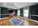 Bedroom with tray ceiling, natural light, and dark blue walls at 3270 Kings Row Dr, Rock Hill, SC 29732