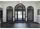 Elegant foyer featuring black tile flooring and a front door with sidelight windows at 3270 Kings Row Dr, Rock Hill, SC 29732