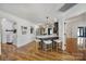Open concept kitchen with island seating, modern light fixtures, and stainless appliances at 3270 Kings Row Dr, Rock Hill, SC 29732