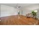 Bright living room with hardwood floors, white wainscoting, and neutral paint at 3270 Kings Row Dr, Rock Hill, SC 29732