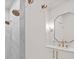 Elegant bathroom featuring dual shower heads, modern fixtures, and a vanity at 3300 Sharon Rd, Charlotte, NC 28211