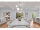 Elegant dining area featuring modern lighting, neutral colors, and views to an office and living room at 3300 Sharon Rd, Charlotte, NC 28211