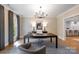 Bright office with large windows, modern lighting, and neutral decor at 3300 Sharon Rd, Charlotte, NC 28211