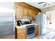 Kitchen area featuring classic cabinetry, stainless steel appliances, and countertop space at 3842 Harmony Rd, Catawba, SC 29704
