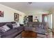 Cozy living room showcasing plush sofas, round coffee table, and ample natural light at 3842 Harmony Rd, Catawba, SC 29704