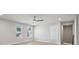 Bedroom with ceiling fan, neutral paint, hardwood floors, and natural light from the windows at 404 Balboa St, Matthews, NC 28104