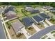 A collection of new homes with well-maintained lawns, paved driveways, and professional landscaping enhance curb appeal at 4171 Canopy Creek Dr, Denver, NC 28037