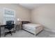Bedroom with carpet, neutral paint, blinds, and a desk with a modern office chair at 4171 Canopy Creek Dr, Denver, NC 28037