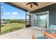 Cozy screened porch with a beautiful view and a ceiling fan at 4171 Canopy Creek Dr, Denver, NC 28037