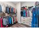 Spacious walk-in closet offering ample storage with organized shelving and a built-in dresser at 4171 Canopy Creek Dr, Denver, NC 28037