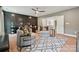 Well-appointed home office featuring modern furnishings, a large desk, and comfortable seating area at 424 Balboa St, Matthews, NC 28104