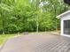 Large wooden deck in a private, wooded backyard setting at 4301 Middle Stream Rd, Charlotte, NC 28213