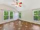 Bedroom with hardwood floors, vaulted ceilings, and bright natural light at 4301 Middle Stream Rd, Charlotte, NC 28213