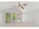 Bright bedroom with large windows offering ample natural light and neutral carpet at 4301 Middle Stream Rd, Charlotte, NC 28213