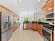 Open kitchen with stainless steel appliances, granite countertops, and ample cabinet space at 4301 Middle Stream Rd, Charlotte, NC 28213