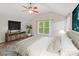 Main bedroom with vaulted ceiling, wood floors, and lots of natural light at 4301 Middle Stream Rd, Charlotte, NC 28213