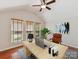 Bright home office with wood floors, vaulted ceilings, and a comfortable workspace at 4301 Middle Stream Rd, Charlotte, NC 28213