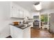 Well-appointed kitchen featuring white cabinets, granite countertops, and stainless steel appliances at 4360 Woodglen Ln, Charlotte, NC 28226