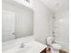 This bathroom features a white sink vanity, toilet, and shower-tub combination at 5030 Ashley Place Dr, Bessemer City, NC 28016