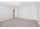 This spacious bedroom features neutral walls, carpeted floors, and great natural light at 5030 Ashley Place Dr, Bessemer City, NC 28016