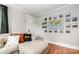 Cozy living room with neutral tones, decorative wall art, and a comfortable sectional sofa at 506 Englewood Ne St, Concord, NC 28025