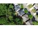 Wonderful aerial view of homes with fenced yards, tree-lined streets, and quiet residential charm at 5106 Stone Park Dr, Charlotte, NC 28269