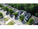 Charming neighborhood featuring well-maintained homes, mature trees, and inviting streetscapes on a sunny day at 5106 Stone Park Dr, Charlotte, NC 28269