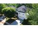 Beautiful two-story home with attached garage, well-manicured lawn, and mature landscaping at 5106 Stone Park Dr, Charlotte, NC 28269