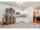 Bright kitchen with white cabinets, granite countertops, and stainless steel microwave at 5106 Stone Park Dr, Charlotte, NC 28269