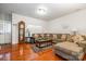 Spacious living room features hardwood floors, large windows, and comfortable seating at 5106 Stone Park Dr, Charlotte, NC 28269