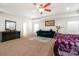 Large main bedroom has natural light, neutral carpet, and dark wood furniture at 5106 Stone Park Dr, Charlotte, NC 28269