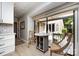 Cozy breakfast nook featuring a small table, chairs and a view of the outdoor patio at 5128 Dunes Ct, Charlotte, NC 28226