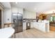 Bright kitchen featuring stainless steel appliances and white cabinets with modern finishes at 5128 Dunes Ct, Charlotte, NC 28226