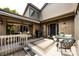 Outdoor patio with grill and glass doors leading to the interior at 5128 Dunes Ct, Charlotte, NC 28226