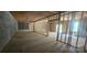 Unfinished basement featuring concrete walls and wood framing, offering potential for a customizable living area at 532 Robinhood Rd # 27, Maiden, NC 28650
