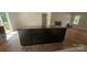 Large kitchen island with dark cabinets and granite countertop at 532 Robinhood Rd # 27, Maiden, NC 28650