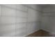 Bright walk-in closet with ample storage, wire shelving, and wood-look flooring at 532 Robinhood Rd # 27, Maiden, NC 28650