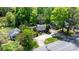 Aerial view of property showcasing its location, landscaping, and proximity to surrounding neighborhood at 536 Hartness Rd, Statesville, NC 28677