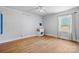 Bedroom features hardwood floors, natural light from the window, and a small sink at 536 Hartness Rd, Statesville, NC 28677