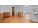 Living room with hardwood floors, and utility sink at 536 Hartness Rd, Statesville, NC 28677