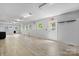 Spacious room with multiple windows, lighting, and functional amenities at 536 Hartness Rd, Statesville, NC 28677