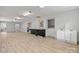 Expansive room with modern flooring, clean white walls, and functional cabinetry at 536 Hartness Rd, Statesville, NC 28677