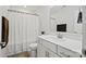 Well-lit bathroom with white vanity, modern fixtures, and shower with curtain at 536 Rustlewood Way, Rock Hill, SC 29732