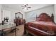 Spacious bedroom with luxury vinyl plank floors, ceiling fan and neutral walls at 536 Rustlewood Way, Rock Hill, SC 29732