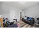 Neutral flex room with a gray couch, work out equipment and good lighting at 536 Rustlewood Way, Rock Hill, SC 29732