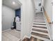 Hallway and staircase view with luxury vinyl plank floors, leading to the laundry room at 536 Rustlewood Way, Rock Hill, SC 29732
