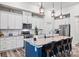 Modern kitchen with white cabinets, a large island, granite countertops, and stainless appliances at 536 Rustlewood Way, Rock Hill, SC 29732