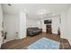 Spacious living room with hardwood floors, cozy couch, and entertainment area at 536 Rustlewood Way, Rock Hill, SC 29732