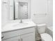 Bathroom vanity featuring a white countertop and matching cabinets, with silver hardware at 6161 Helens Rest Ln, Lincolnton, NC 28092