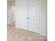 Spacious closet with double doors, carpeting and additional hallway entrances at 6161 Helens Rest Ln, Lincolnton, NC 28092